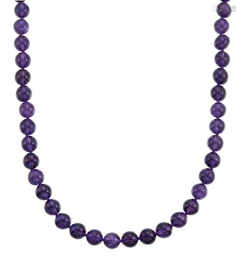 An amethyst bead necklace, composed of a single row of polished beads, slightly graduating from