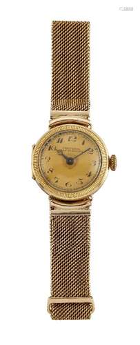 A lady's 9ct gold wristwatch by Kemp Brothers, the circular dial with Arabic numerals to a reeded