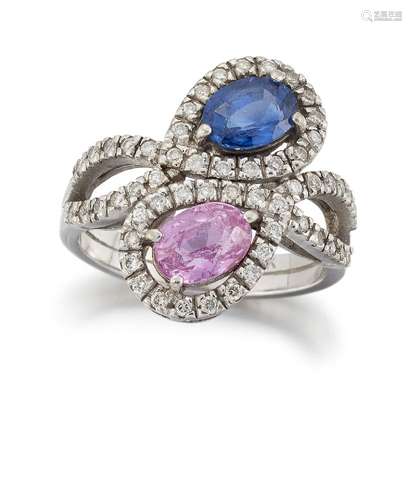 A sapphire, pink sapphire and diamond ring, of crossover design, the terminals set with either a