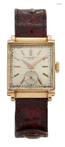 An 18ct gold wristwatch by Patek Philippe, the square silvered dial with applied gold baton