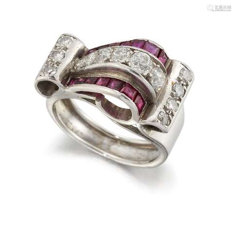 An Art Deco platinum, diamond and ruby cocktail ring, of scrolling form, set with brilliant-cut