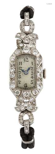 A lady's Art Deco platinum and diamond wristwatch, the rounded rectangular dial with Arabic numerals