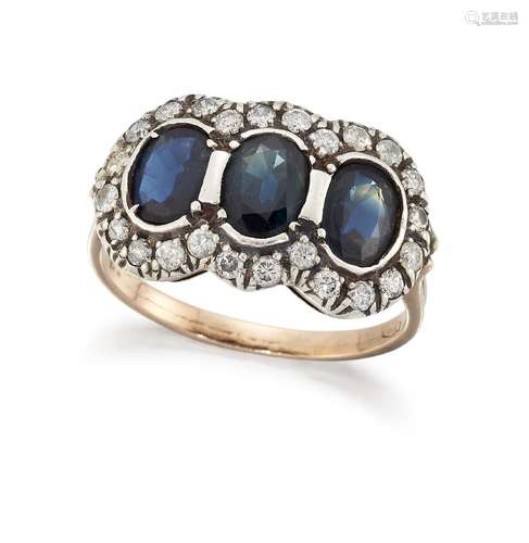 A sapphire and diamond ring, of triple cluster design, composed of three collet-set oval mixed-cut