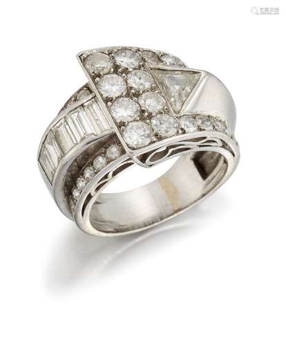 An Art Deco platinum and diamond cocktail ring, of buckle design, set with a triangular-cut