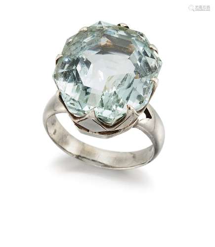 An aquamarine single stone ring, the octagonal aquamarine in eight claw mount to a plain hoop,