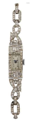 A lady's Art Deco, platinum and diamond cocktail watch, the rectangular dial with Arabic numerals,