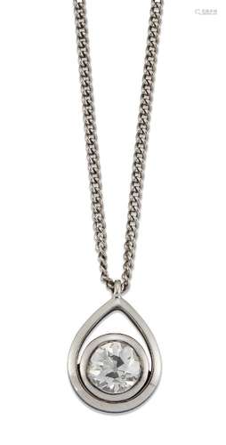 A diamond single stone pendant, the old-brilliant-cut diamond collet within a pear shaped frame,