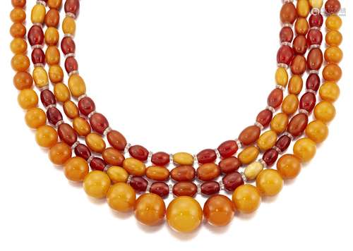 Four amber necklaces, comprising: a bead single row, graduating from approximately 18.7 to 8.0mm, to