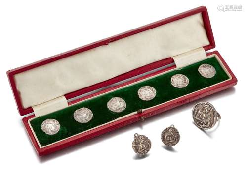 A set of six Art Nouveau silver buttons, each with female profile, maker's mark H.W.K, five with