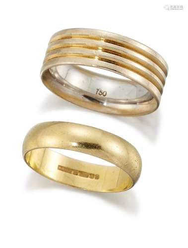 Two band rings, the first 18ct gold, London hallmarks, 1991, 4.3g, the second of reeded design, ring