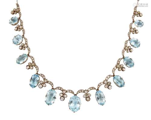 A late 19th century aquamarine and diamond necklace, composed of a fringe of graduated oval