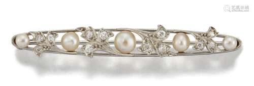 An early 20th century American platinum, diamond and pearl brooch, modelled as an openwork bar