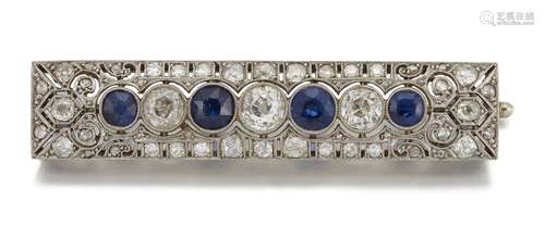 An early 20th century sapphire and diamond brooch, the pierced rectangular panel set to the centre