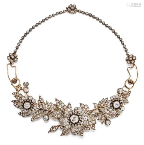 A late 19th century diamond necklace, the front composed of three old-cut diamond graduated floral