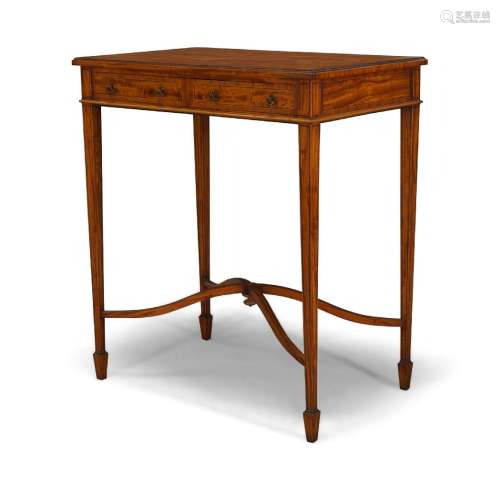 An Edwardian satinwood, crossbanded and ebony strung side table, the rectangular top above two
