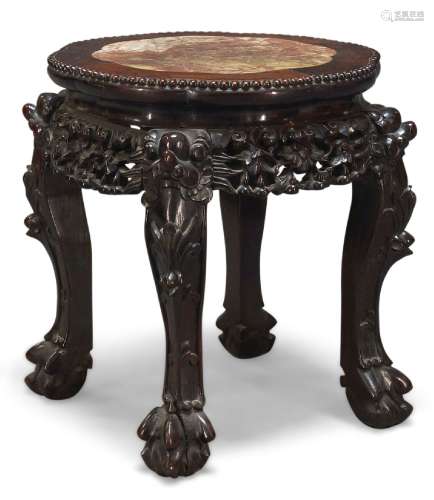 A Chinese rosewood low jardinière stand, 19th Century, the shaped top inset with rouge marble