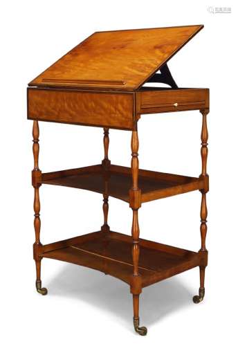 A Victorian satinwood and line inlaid etagere, late 19th Century, the adjustable bookstand top on