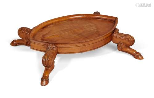 A satinwood navette-shape kettle stand, 19th century, the oval gallery top on pied-de-biche feet,