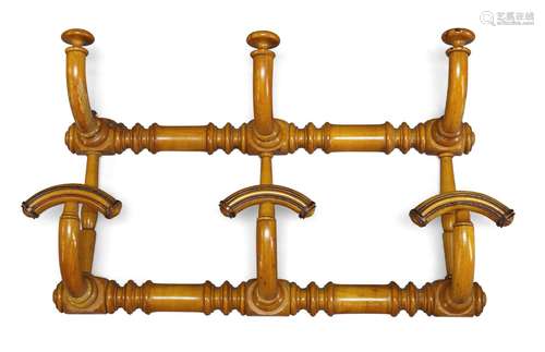 A late Victorian satinwood turned hat and coat rack, with six hooks, 37cm high, 60cm widePlease