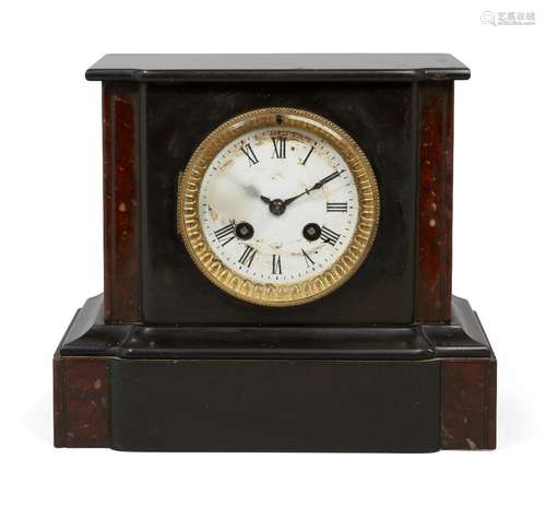 A late 19th Century French black slate and marble mantel clock, bell-striking movement, 22cm wide.