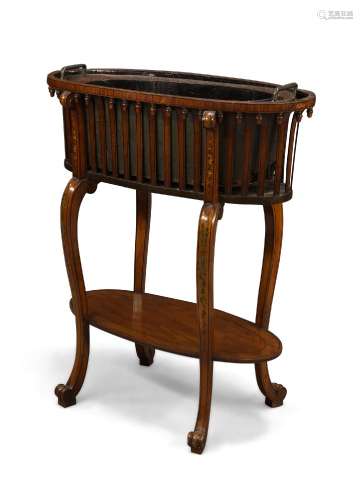 A late Victorian painted satinwood jardinière, the oval slatted top with metal liner, on foliate