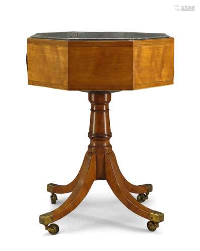 A George III satinwood and line inlaid jardinière stand, the octagonal top with liner, on turned