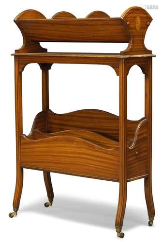 An Edwardian satinwood book trough, the three section trough above single shelf and three section