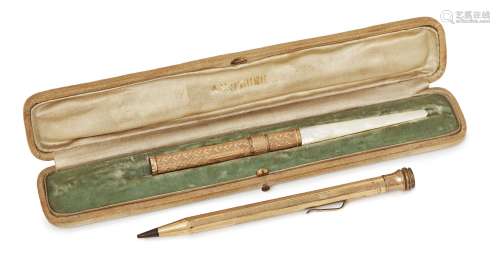 An early 20th century gold-mounted dip pen, by A.W. Faber, New York, with engine-turned body, mother