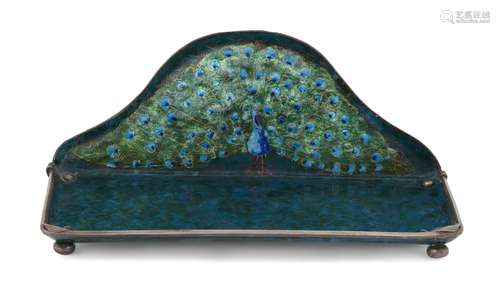 An Arts & Crafts enamelled metal “Peacock” pen tray c.1900, apparently unsigned enamelled back and