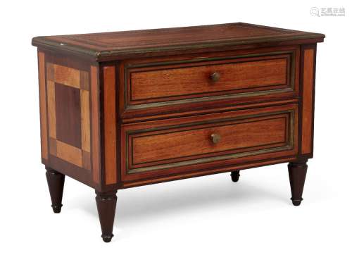 A French miniature satinwood commode, 19th century, the top with brass edging enclosing inlaid