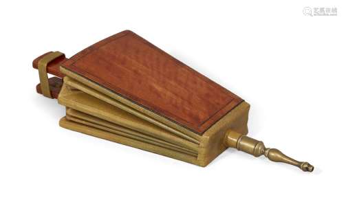 A pair of Regency satinwood and leather fire bellows, the trapezoid-shape body with heart shaped cut