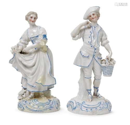 A pair of 19th Century German blue and white porcelain figures, The Grape Pickers, bears marks to