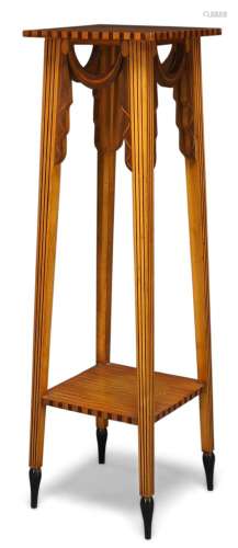 An inlaid satinwood two-tier jardinière stand, early 20th Century, the square top above swag drapery