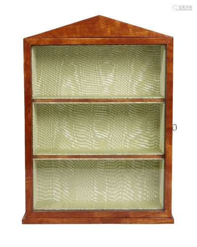 A George III satinwood wall display cabinet, with pointed arch pediment above a glass panel door