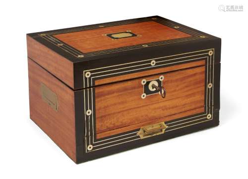 A Regency satinwood ebonised and brass strung travelling toilet box, the mother of pearl inlaid