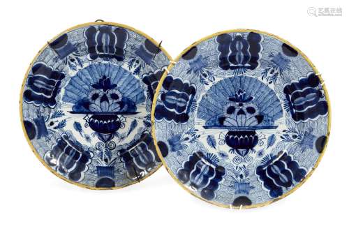 A pair of 18th century Dutch blue and white Delft “Peacock” plates, bears marks to verso, 23 cm