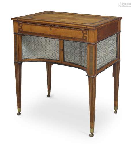 A George III satinwood and rosewood crossbanded writing table, the key-cornered top, with adjustable