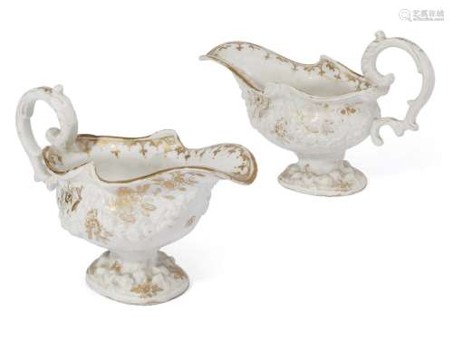 A pair of Bow porcelain silver-shaped rococo-style gravy boats, circa 1750-1755, moulded floral