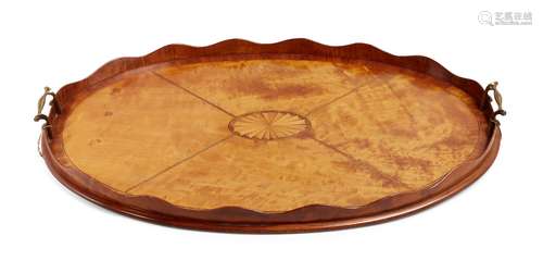 A George III satinwood oval tray, wavy gallery, with central inlaid batwing oval and twin brass