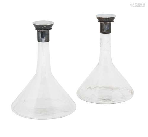 A pair of Heath & Middleton silver mounted glass flasks in the manner of Dr. Christopher Dresser