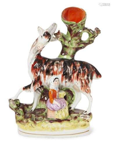 A Victorian Staffordshire milkmaid and goat flatback chimney vase, 23.5cm high.Please refer to