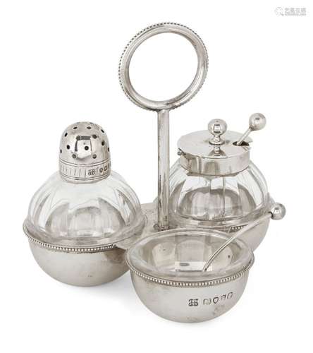 Attributed to Dr. Christopher Dresser (1834-1904), a Hukin and Heath silver and glass three-piece