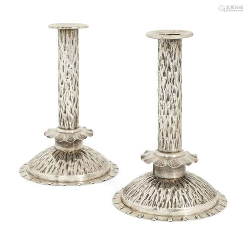 A pair of Heath & Middleton silver candlesticks in the manner of Dr Christopher Dresser Mark of