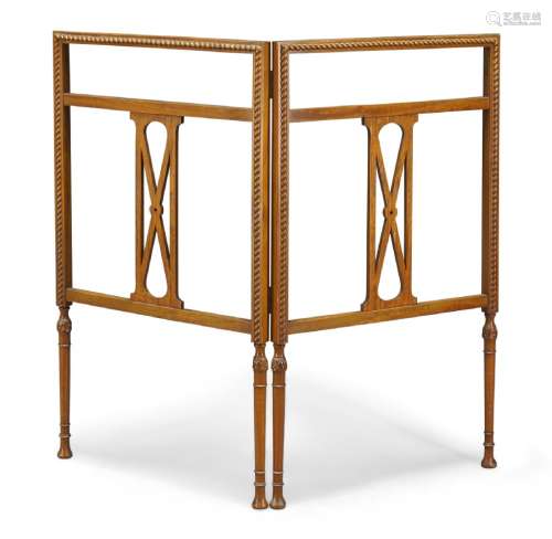 An Edwardian satinwood folding towel rail, each panel centred by pierced splat with rope twist