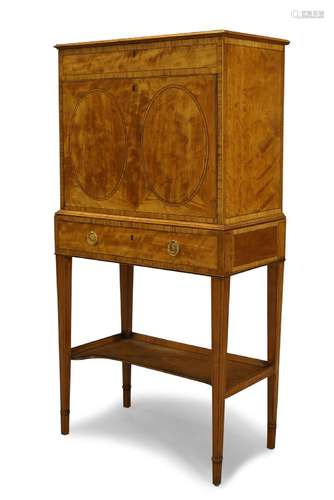 A satinwood, crossbanded and ebony line inlaid fall-front desk, 19th Century, the hinged top