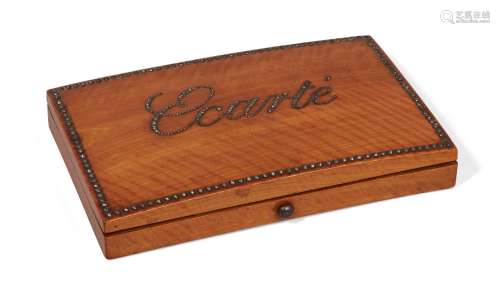 A French satinwood and cut steel Ecarte box, 19th century, the lid titled opening to reveal a fitted
