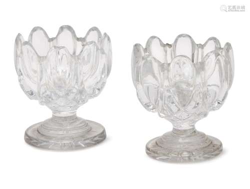 A pair of 19th Century French lobed salt cellars 7cm wide, (2). Provenance: Brian Watson antique