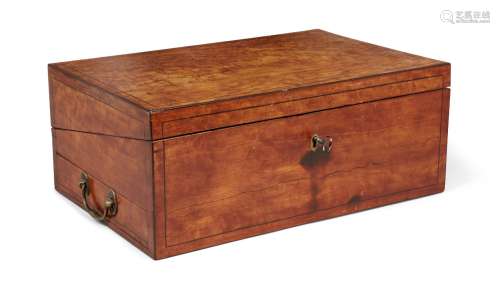 A George III satinwood oblong desk box, the ebony strung lid and body opening to reveal a fitted