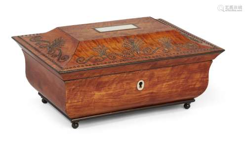 A French satinwood and cut-steel sewing necessaire, 19th century, of sarcophagus and ogee shape