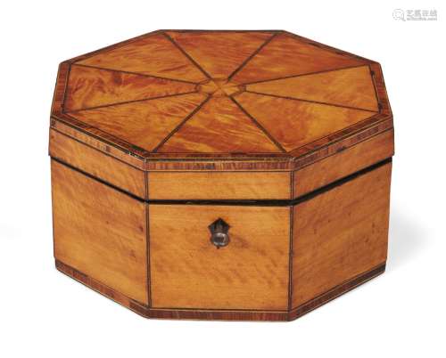 A George III satinwood octagonal box, the sectional top with ebony stringing around central inlaid